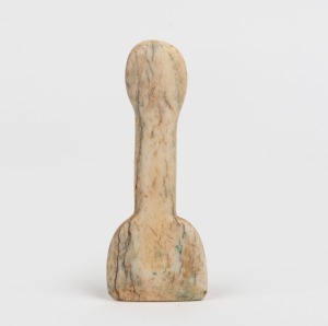 An antique carved whalebone seam rubber, 19th century, 13cm long