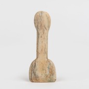 An antique carved whalebone seam rubber, 19th century, 13cm long