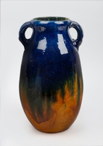 265 · BOSLEY (attributed) blue and brown glazed two handled pottery vase, 34cm high