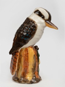 371 · ANITA RAEY impressive pottery kookaburra statue with applied gumnuts and leaves on tree stump base, impressed mark to base "Anita Raey", 24cm high
