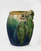 REMUED blue and green glazed pottery vase with applied gumnuts, leaves and branch handle, incised "Remued, 114/6M", 18cm high