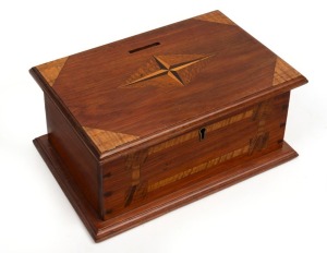 An Australian timber donation box with starbust inlaid top, 19th/20th century, 10cm high, 23cm wide, 15cm deep.