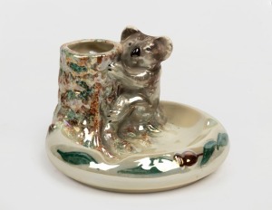 345 · WEMBLEY WARE koala tree stump ashtray with lustre glaze, impressed factory mark to base, 9cm high, 13.5cm wide
