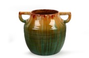 JOHN CAMPBELL green and yellow glazed pottery vase with two handles, incised "John Campbell, Tasmania", ​​​​​​​18cm high, 23cm wide.