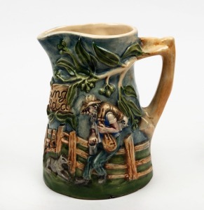 WALTZING MATILDA pottery jug with musical movement, 19.5cm high