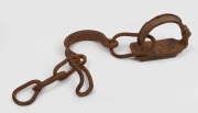Convict leg irons, 19th century, 56cm wide.