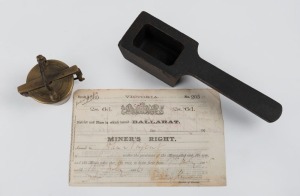 Gold ingot mould, together with an attractive set of brass weights, and&nbsp;a Ballarat MINER'S RIGHT (circa 1905), (3 items), the single mould&nbsp;24cm long.