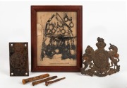 Convict cell door Warder's peep hole, group of three antique handmade convict nails from Port Arthur, a framed print titled "Instruments Used To Subdue Prisoners", and an antique British cast metal coat of arms, 19th/20th century, (6 items, the print 24 x
