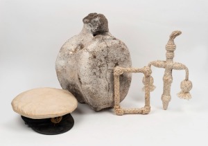 227 · Captain's cap, sailor's rope work folk art (2), and a whale's vertebrae seat, (4 items), the vertebrae 26cm high, 40cm wide.