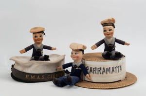 228 · Three sailor souvenir dolls, together with a straw boater with PARRAMATTA hatband and a sailor's hat with "H.M.A.S. CERBERUS" hatband, (5 items).