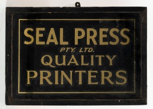 SEAL PRESS QUALITY PRINTERS: Framed sign with gilt lettering on black tin, 19th century, 35 x 50cm overall