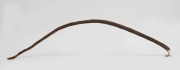 An antique whale pissel&nbsp;with drilled&nbsp;lanyard hole, 19th century, 80cm long