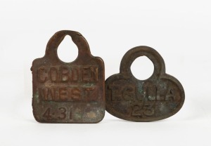 Two antique Australian livestock badges "Cobden West" and "T. Gulla", circa 1885. Note: These tags were used to identify livestock on common grazing land before the era of enclosement. 8cm and 6.5cm high.