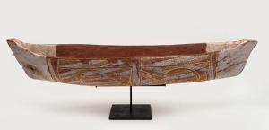 ARTIST UNKNOWN, (canoe), carved wood with cross hatched decoration in natural pigments, mounted on bespoke metal stand, 87cm long. PROVENANCE: Purchased from Black's Museum in Portland, Victoria, circa 1970. Bearing Sotheby's auction label, November 2005.