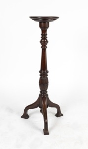 A Tasmanian blackwood torchiere&nbsp;stand with turned and reeded column standing on cabriole legs with pad feet, circa 1910, 107cm high, the top 28cm diameter&nbsp;