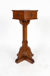 An Australian mountain ash Gothic revival baptism font, chamfered stand with Gothic influence braced base