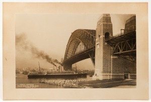 R.M.S. ORMOND PASSING UNDER THE SYDNEY HARBOUR BRIDGE, SYDNEY, NEW SOUTH WALES: Silver gelatin print laid down on original card mount, most likely part of the procession of the opening of the Sydney Harbour Bridge, 1932,&nbsp; 18 x 29cm, 23 x 35cm overall
