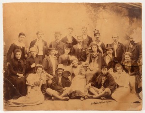 AMATEUR THEATRE GROUP IN COSTUME: St Brigid's Fitzroy, Melbourne, circa 1900, original sepia silver gelatin print by A. Murks & Co. of Carlton. Unusually large format on original board mount. (Distressed but impressive). 36 x 46cm
