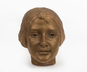 246 · L. J. HARVEY fired plaster mask with bronzed finish, incised "L. J. Harvey", with possible title (illegible), 17cm high