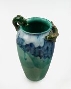 A blue and green glazed pottery vase with applied fish decoration, incised monogram to base (illegible), 22cm high
