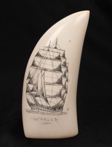 198 · A scrimshaw whales's tooth with tallship portrait titled "WHALER, 1850", signed lower right (illegible), ​​​​​​​13.5cm high