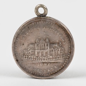 INTERNATIONAL EXHIBITION BRISBANE 1897 small silver medal&nbsp;(17mm; Carlisle 1897/77) depicting the Exhibition building on the reverse, the obverse with the legend "STRUCK AT THE EXHIBITION MINT" (where Stokes were exhibitors).