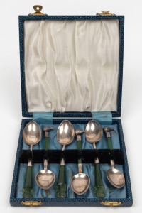 63 · Six assorted sterling silver and New Zealand greenstone teaspoons with kiwi and Tiki decoration, 19th/20th century, 11cm and 12cm long.