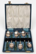 Six assorted sterling silver and New Zealand greenstone teaspoons with kiwi and Tiki decoration, 19th/20th century, 11cm and 12cm long.
