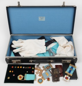 MASONIC REGALIA housed in original case, including gloves, buttons, medals etc., of note a 9ct gold medallion with ribbons (17.6 grams including ribbon), the case 45cm wide
