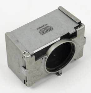 LEITZ: Rare silver New York-made SOOPD collapsible lens hood for Summitar lens.