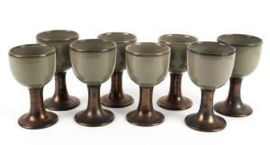 R. M. BECK set of eight Australian pottery goblets with green and bronze glaze, incised "R. M. Beck", 14cm high