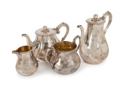 An antique silver plated four piece tea service in fitted timber case, 19th century, the coffee pot 23cm high&nbsp;
