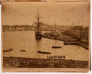 A large (dilapidated) album containing a collection of medium and large-format albumen paper prints laid down on thick album leaves and all with neat pen annotations. Scenes noted include Circular Quay, Sydney from Pyrmont, A.S.N. Company's Wharf Pyrmont,