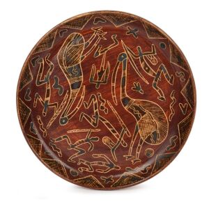 323 · CARL COOPER pottery plate with sgraffito Aboriginal decoration, incised "Carl Cooper, Australia, 1954", 18cm diameter