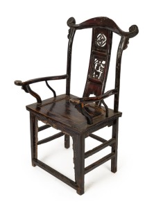 An antique Chinese carved wooden yoke chair with remains of lacquer finish, 19th century, 114cm high, 63cm across the arms