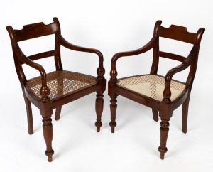Two antique Anglo-Indian carver chairs with woven cane seats, 19th century, 51cm and 52cm across the arms