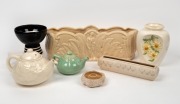 GREENWAY pottery flower trough, RATHJEN pottery flower trough and candle holder, CHARLES WILTON black and white pottery vase, McCREADIE green glazed pottery teapot, flannel flower vase and cream glazed teapot with flannel flower decoration, (7 items), the