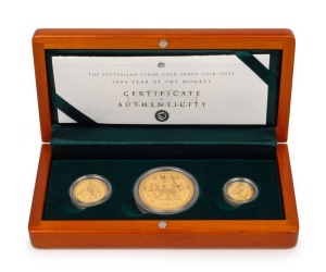 2004 YEAR OF THE MONKEY: AUSTRALIAN LUNAR GOLD BULLION COIN PROOF SERIES of three coins, comprising of the $100 (1oz), the $25 and the $15, all depicting a monkey; in the original silk-lined timber case of issue and accompanied by a Certificate of Authenticity indicating that this is set No.0472.