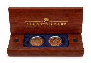 A SHIELD SOVEREIGN SET from The Perth Mint: A small timber case containing an 1884S Victoria Young Head sovereign with Shield back, aUnc; together with an English 2002 Proof Sovereign with Shield back. Accompanied by a Certificate of Authenticity identifying this as Set No.0011 of only 150 issued.