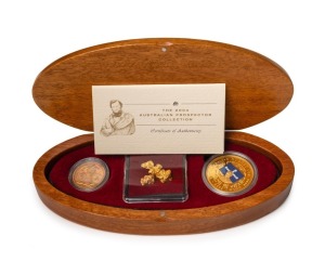 2004 AUSTRALIAN PROSPECTOR COLLECTION from The Perth Mint: comprising of the $100 (1oz) Eureka Stockade pure gold coin, an uncirculated 1904P Sovereign, and several loose Gold Nuggets weighing 7.93 grams. All presented in an oval-shaped timber case featuring Peter Lalor and accompanied by a Certificate of Authenticity numbered 038 of only 150 produced.