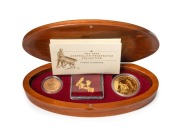 2002 AUSTRALIAN PROSPECTOR COLLECTION from The Perth Mint: comprising of the $100 (1oz) Dry Blowing Prospector pure gold coin, an uncirculated 1902P Sovereign,&nbsp;and several loose Gold Nuggets weighing 7.91&nbsp;grams. All presented in an oval-shaped timber case