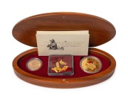 2001 AUSTRALIAN PROSPECTOR COLLECTION from The Perth Mint: comprising of the $100 (1oz) Prospector panning pure gold coin, an uncirculated 1931P Sovereign,&nbsp;and several loose Gold Nuggets weighing 7.88 grams. All presented in an oval-shaped timber case fea