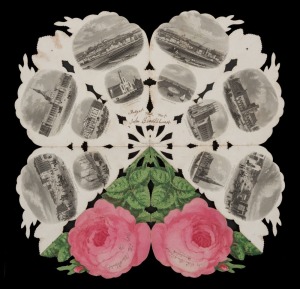 VICTORIA - Postal History: THE MELBOURNE ROSE. Printed by C. Adler, Hamburg, [circa 1860]. Diecut card souvenir in the shape of a pink rose with green leaves, folding out to display 28 steel-engraved views (front and back), most after S.T. Gill; 13 x 7cms folded, opening to 26 x 26cms. Contained in the original envelope decorated with an Australian coat-of-arms and allegorical figures, and with the additional imprint of the Melbourne co-publishers, Mollenbaeck, Ullhorn & Co., Melbourne.