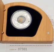 2004 $1 Eureka Stockade 150th Anniversary Silver Locket Coin incorporating small gold nuggets, attractively presented in a special timber case and accompanied by the Certificate of Authenticity No.07301. - 2