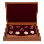1995 - 2003 FLORAL EMBLEMS OF AUSTRALIA: A complete set of nine uncirculated&nbsp;22ct gold $100 coins presented in a superb timber case with felt lining; each coin accompanied by its' own Certificate of Authenticity and Limitation; and the booklet which accom
