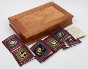 1995 - 2003 FLORAL EMBLEMS OF AUSTRALIA: A complete set of nine PROOF&nbsp;24ct gold $100 coins presented in a superb timber case with felt lining; each coin accompanied by its' own Certificate of Authenticity and Limitation; and the booklet which accompanies - 2