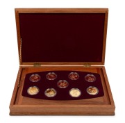 1995 - 2003 FLORAL EMBLEMS OF AUSTRALIA: A complete set of nine uncirculated&nbsp;22ct gold $100 coins presented in a superb timber case with felt lining; each coin accompanied by its' own Certificate of Authenticity and Limitation; and the booklet which accom