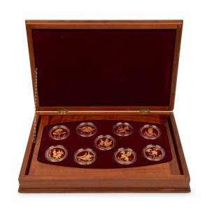 1995 - 2003 FLORAL EMBLEMS OF AUSTRALIA: A complete set of nine PROOF 24ct gold $150 (½oz) coins presented in a superb timber case with felt lining; each coin accompanied by its' own Certificate of Authenticity and Limitation; and the booklet which accompanies the whole set.