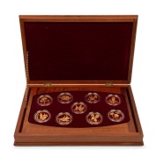 1995 - 2003 FLORAL EMBLEMS OF AUSTRALIA: A complete set of nine PROOF&nbsp;24ct gold $150 (&frac12;oz) coins presented in a superb timber case with felt lining; each coin accompanied by its' own Certificate of Authenticity and Limitation; and the booklet which accomp