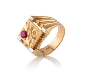 A Kuwaiti 18ct gold signet ring, set with a cut ruby, 14.2 grams